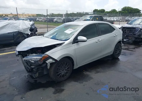 2017 Toyota Corolla Le z USA, uszkodzony, nr VIN 5YFBURHE5HP713219